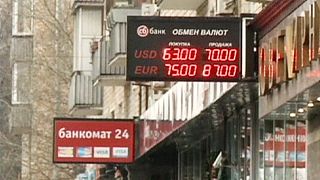 Russian rouble rebounds slightly but remains volatile