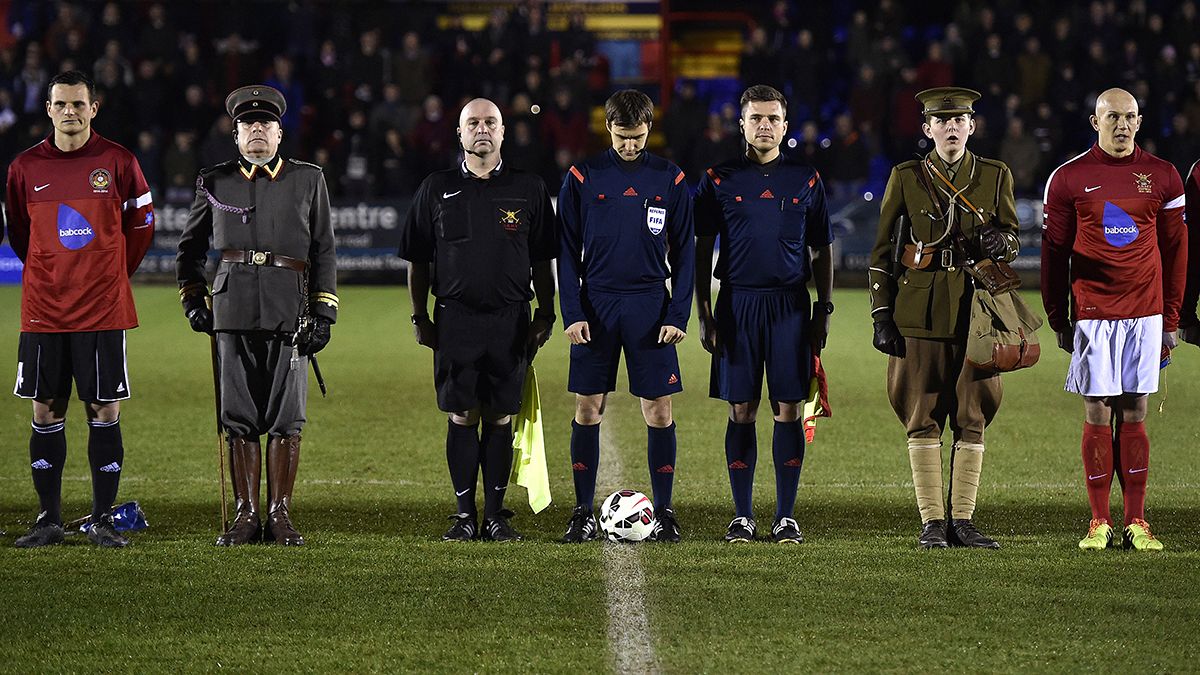 British and German troops hold commemorative football match to mark 1914 Christmas truce