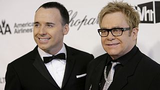 Elton John weds after new UK gay marriage law comes into force
