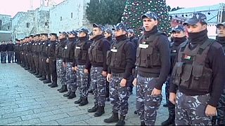High security in Bethlehem as people gather for Christmas eve celebrations