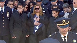 Police officers turn backs on New York mayor during Ramos funeral