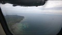 Search for missing Air Asia flight expands after sightings