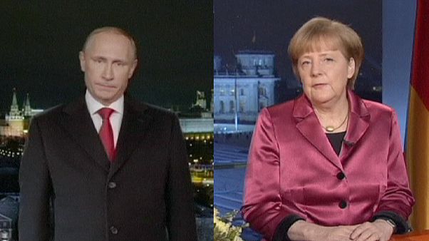 Putin ve Merkel gerginliği yılbaşı mesajlarına yansıdı Putin ve Merkel gerginliği yılbaşı mesajlarına yansıdı
