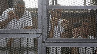 Egyptian court orders retrial of Al Jazeera journalists