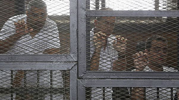 Egyptian court orders retrial of Al Jazeera journalists Egyptian court orders retrial of Al Jazeera journalists