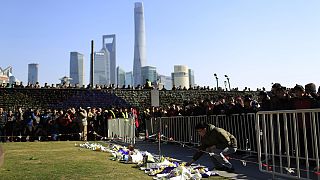 Chinese lay flowers in Shanghai in honour of stampede victims