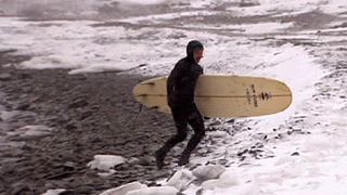 Russia's winter surfers brave freezing temperatures on the waves