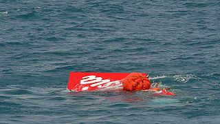 AirAsia QZ8501 tail lifted from Java Sea