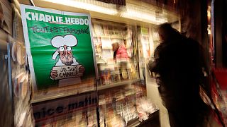 Survivors' edition of Charlie Hebdo goes on sale amid a wave of solidarity