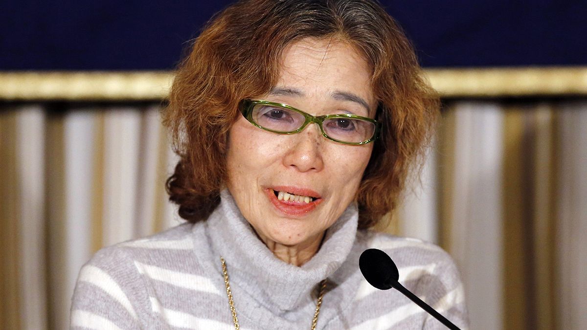 ISIL hostage Kenji Goto's mother begs for his release