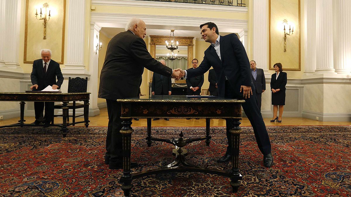 Left-wing, anti-austerity and non-religious: New Greek PM Tsipras takes the reins