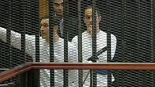 Mubarak sons walk free from jail after Egypt marks revolution anniversary