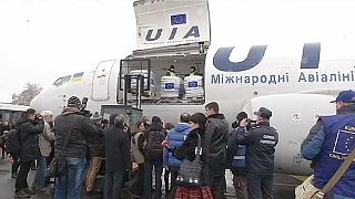 Displaced Ukrainians receive planeload of EU aid, more to follow