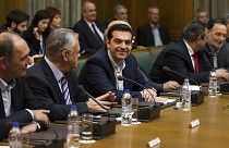 PM Alexis Tsipras tells first cabinet meeting: 'Greece will not default'