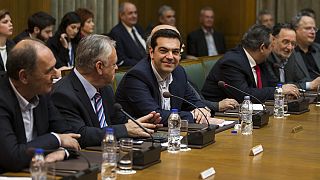 PM Alexis Tsipras tells first cabinet meeting: 'Greece will not default'