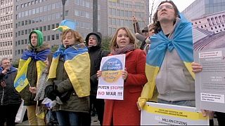 Ukrainian expats rally for tougher EU sanctions