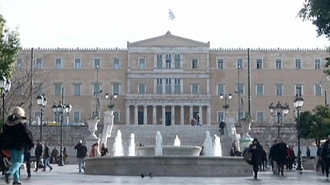 What did Eurogroup head whisper to Greek minister after frosty meeting?