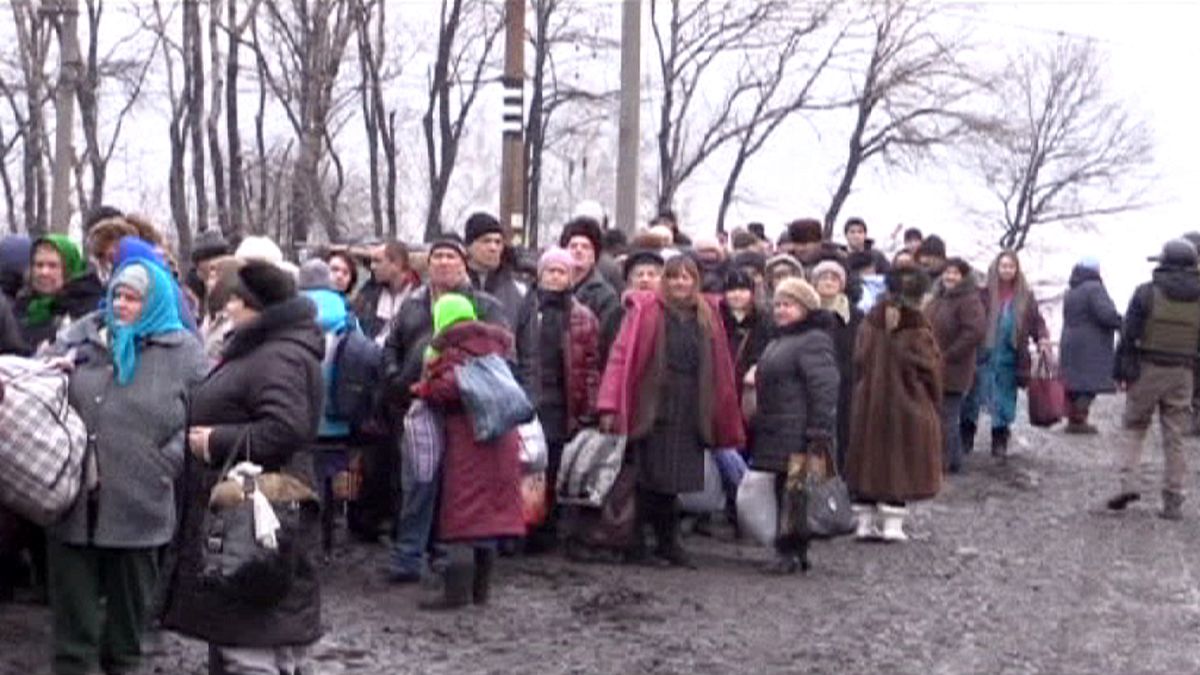 Debaltsevo residents in eastern Ukraine flee fighting through humanitarian corridor