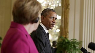 Obama meets Merkel and keeps open mind on whether to send weapons to Ukraine