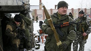 Peace talks in Minsk get underway as fighting in Ukraine continues