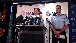 Australian police charge two over terror offences