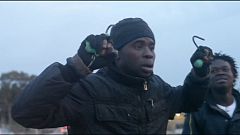African migrants scale barrier to reach Spanish soil