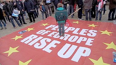 Demonstrators in Athens and Brussels tell EU finance ministers  - no more austerity!