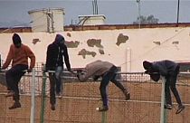 African migrants storm border into Spain