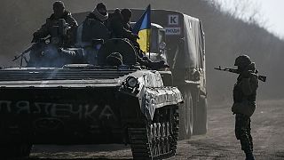 Kyiv says it can not withdraw heavy weapons while still under attack