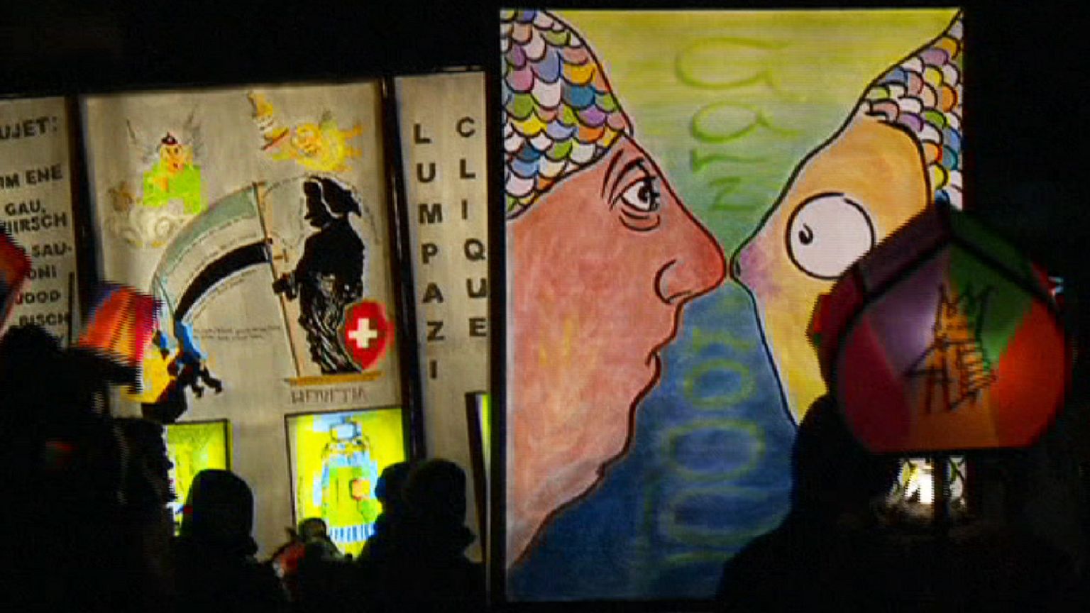Carnival night procession illuminates the streets of Basel