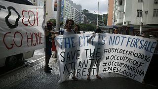 Protesters clash with IOC over Rio golf course