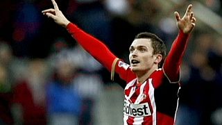 Sunderland's Adam Johnson arrested on suspicion of sex with a minor