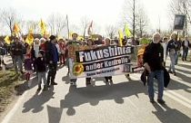 German protesters call for end to nuclear power as they remember Fukushima