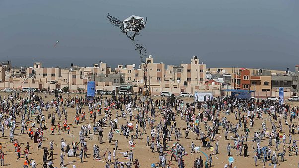 Palestinian children fly kites to mark anniversary of Japan Tsunami Palestinian children fly kites to mark anniversary of Japan Tsunami