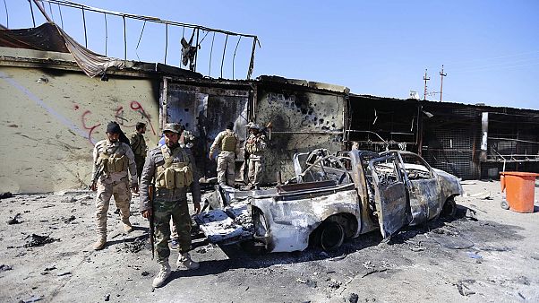 Iraqi army and militia advance into Tikrit as ISIL retreat Iraqi army and militia advance into Tikrit as ISIL retreat