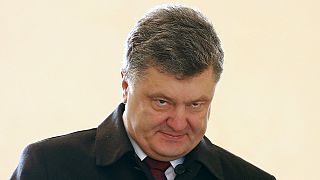 Poroshenko visita Merkel