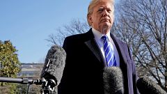 Image: President Donald Trump talks to the media on South Lawn of the White