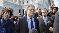 Image: U.S. Senator Franken departs the U.S. Capitol after announcing his r
