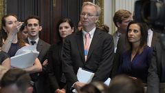 Image: Eric Schmidt  listens as White House senior adviser Jared Kushner sp