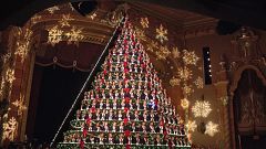 Image: Members of the Mona Shores High School Choir stand in the Singing Ch
