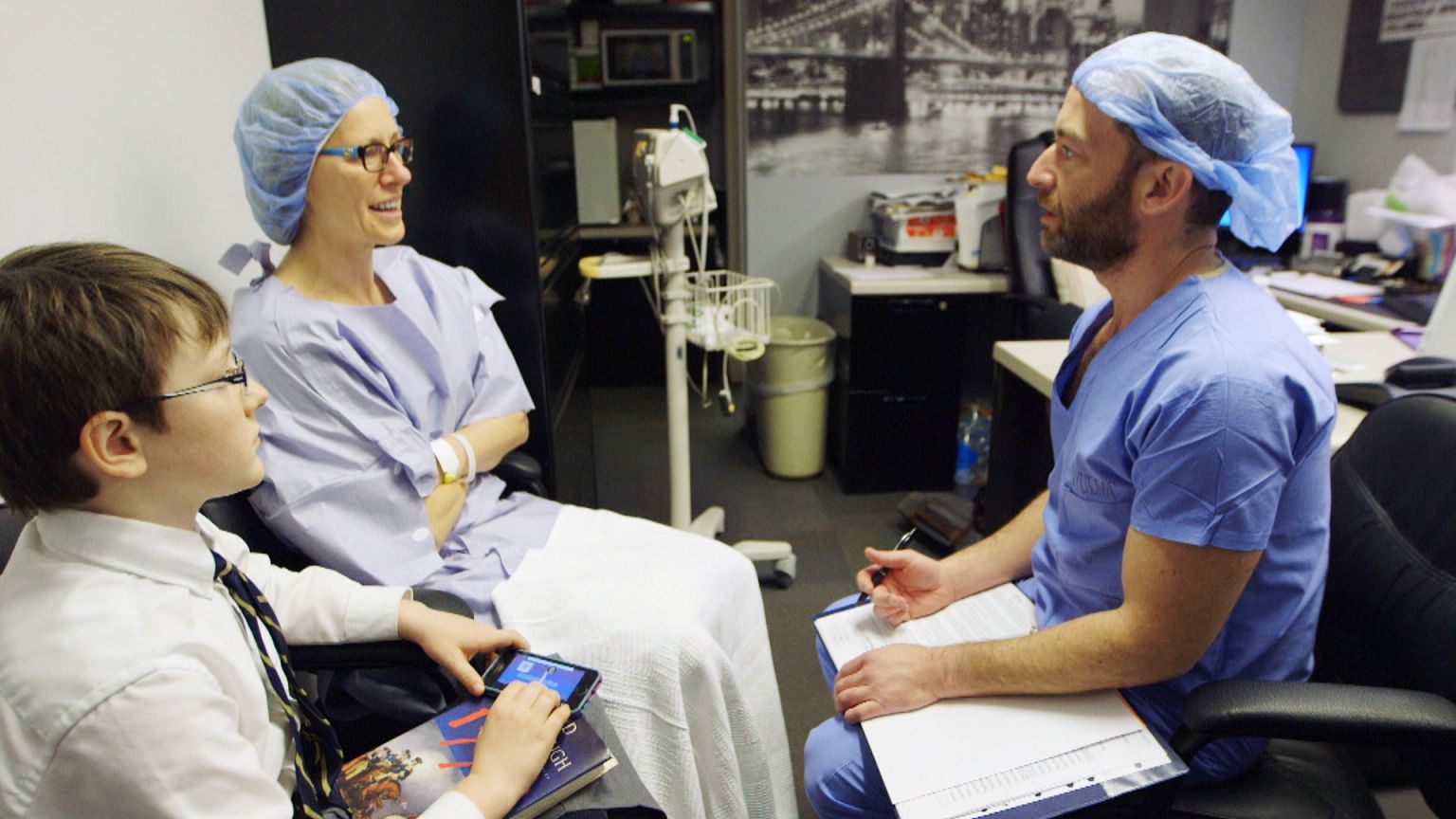 Image: Dr. Julie Luttinger and son Bobby Luttinger meet with Dr. Roy Davido