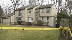 Image: Image: Crime scene tape outside the home of Scott Fricker and his wi