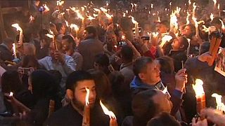 Thousands gather at the Holy Sepulchre in Jerusalem for the start of Orthodox Easter