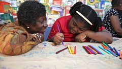 Image: Dr. Claudette Crawford-Brown interacts with Shaniqua Long