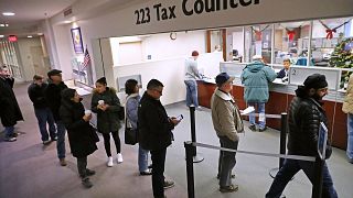 Image: Taxpayers Line Up To Pre-Pay Property Taxes Ahead Of New Tax Law Lim