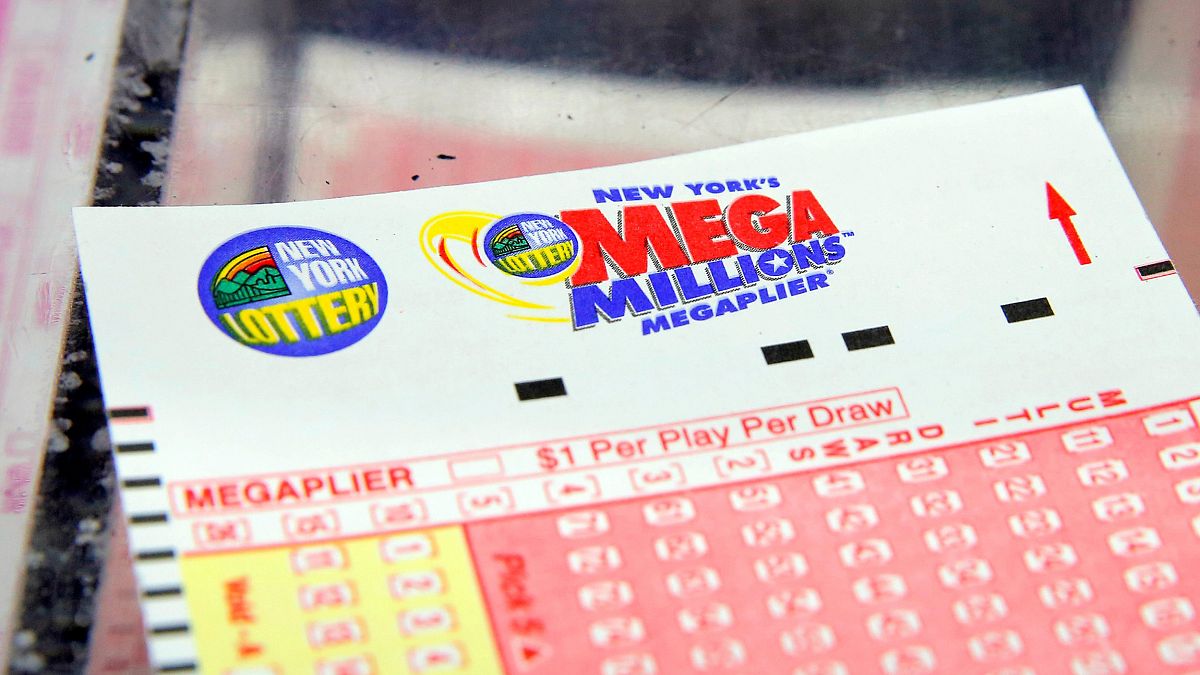Image: A ticket is seen ahead of the Mega Millions lottery draw which reach