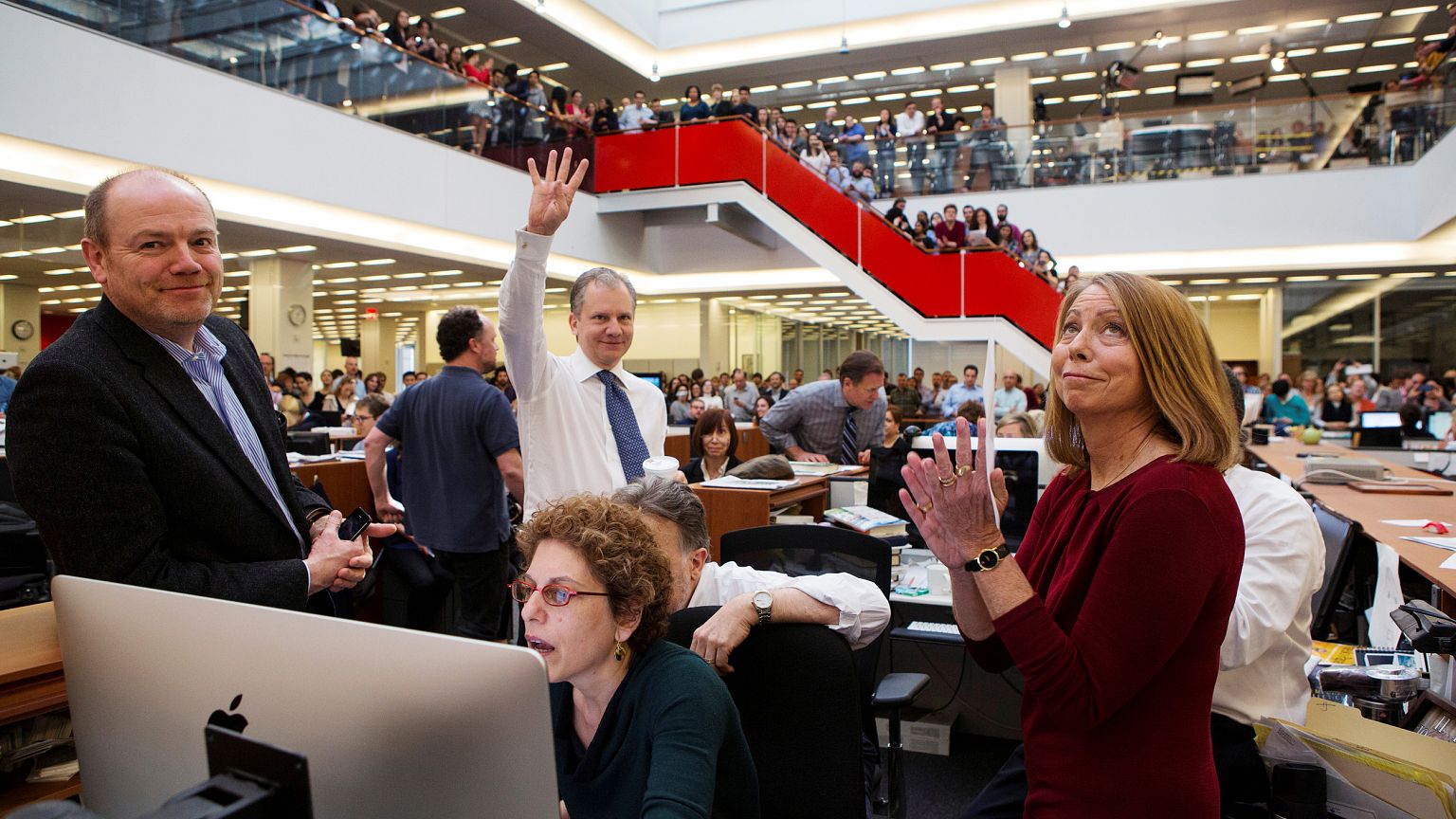 Image: In 2013, publisher Arthur O. Sulzberger Jr. holds up four fingers to