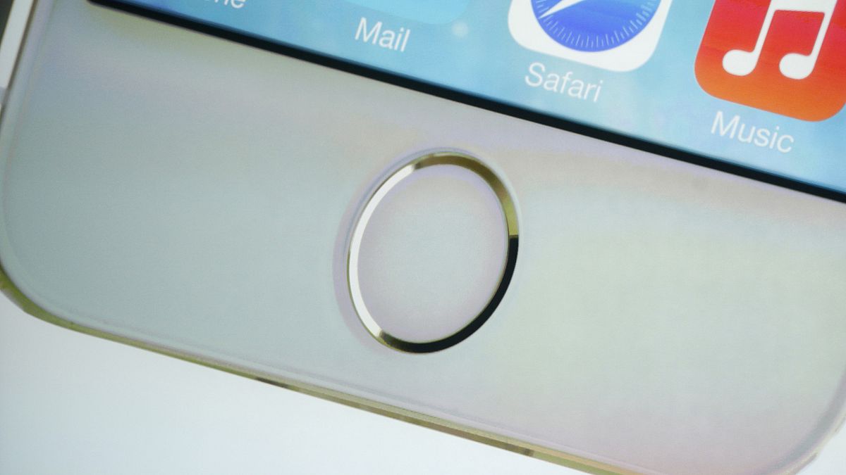 The home button which doubles as a fingerprint sensor is seen on an image o