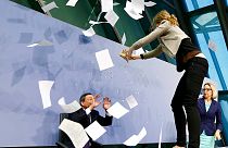 ECB chief Mario Draghi unhurt after protest during speech