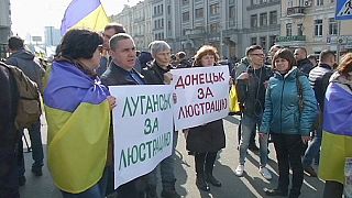 Hundreds protest as top Ukrainian court examines challenge to civil service purge